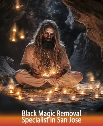 In the heart of a serene cave, a wise figure sits in tranquil meditation, surrounded by the gentle glow of flickering candles. His presence exudes warmth and peaceful wisdom, creating an atmosphere of comfort and trust. Black magic removal in San Jose.