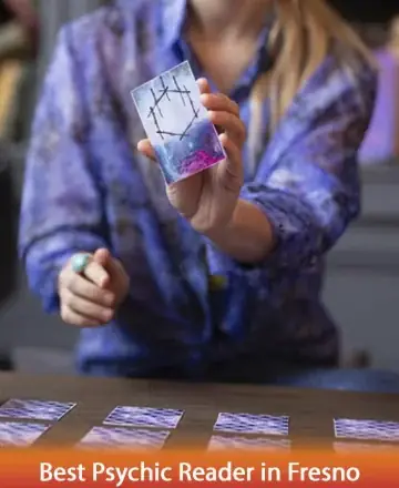 In a serene moment of connection, a gentle hand presents a beautifully illustrated card, inviting you into a realm of insight and tranquility. The soothing hues evoke a sense of calm, guiding you towards clarity and inner peace. Best psychic reader in Fresno.