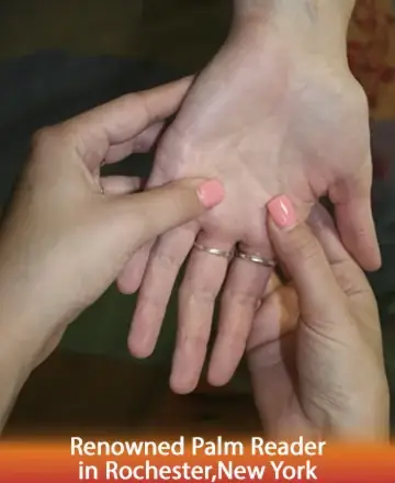 In the gentle embrace of caring hands, a palm is read with wisdom and compassion, revealing life's hidden paths. This serene moment offers solace and understanding, guiding the spirit with kindness. Palm reading in Rochester, New York.