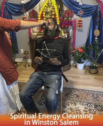 In a serene space adorned with vibrant flowers and soft drapery, a gentle ritual unfolds, bringing peace and clarity. The warmth of spiritual care envelops the soul, inviting transformation and inner harmony. Spiritual energy cleansing in Winston Salem.