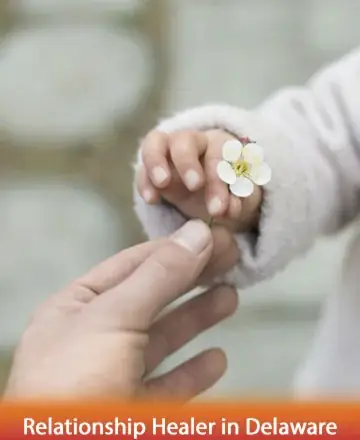 In this tender moment, a gentle hand offers a delicate flower to a tiny grasp, capturing the essence of trust and connection. It reminds us of the simple beauty found in shared moments of warmth and understanding. Relationship healer in Delaware.