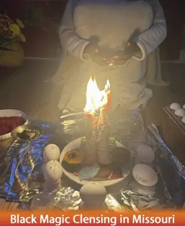 In a serene setting, gentle light flickers from candles, casting a warm glow that envelops the soul in peace and tranquility. The soothing arrangement, surrounded by natural elements, invites a sense of calm and balance. Black magic cleansing in Missouri.