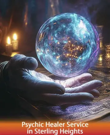 In a serene setting bathed in the gentle glow of candlelight, a hand cradles a shimmering crystal sphere, radiating warmth and ethereal light. This scene invites a sense of calm and introspection, guiding your spirit toward tranquility. Psychic healer service in Sterling Heights.