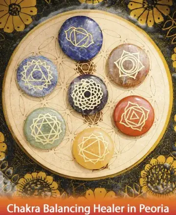 Discover serenity and inner harmony with this vibrant circle of chakra stones, each intricately carved with sacred symbols. They invite tranquility and a gentle alignment of energies, nurturing your spirit and fostering peace within. Find balance with a chakra balancing healer in Peoria.