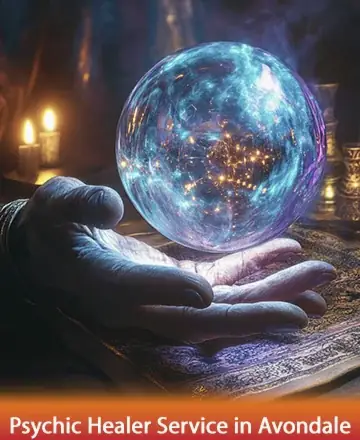In a serene glow, a wise hand cradles a luminous orb, shimmering with celestial serenity. The gentle flicker of candles casts a warm embrace, inviting peace and introspection. This gentle tableau whispers of ancient wisdom and inner calm. Psychic healer service in Avondale.