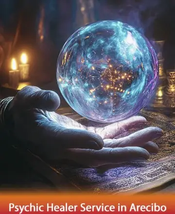 In the gentle glow of candlelight, a mystical crystal ball rests in a wise hand, radiating calm and serenity. Its ethereal light invites introspection and peace, guiding you through life's journey with gentle support. Psychic healer service in Arecibo.