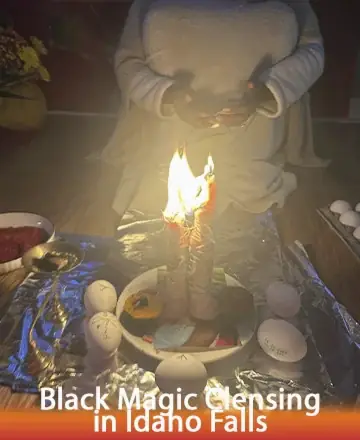 In a serene and sacred space, gentle flames dance atop candles, casting a warm glow that invites peace and reflection. Surrounded by symbols of cleansing and renewal, this moment offers comfort and tranquility, guiding the spirit toward healing and balance. Black magic cleansing in Idaho Falls.