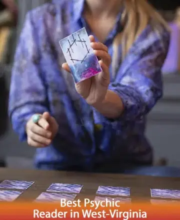 In a serene atmosphere, a gentle hand holds a card, inviting calm reflection and introspection. The soothing colors create a comforting aura, offering wisdom and peace. This moment radiates trust and spiritual clarity. Tarot reading in West Virginia.