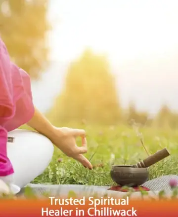 In the gentle embrace of nature, a serene figure finds tranquility, connecting deeply with the earth's nurturing energy. The soft glow of the morning sun bathes the scene in warmth, inviting a moment of reflection and peace. Meditation and mindfulness in Chilliwack.