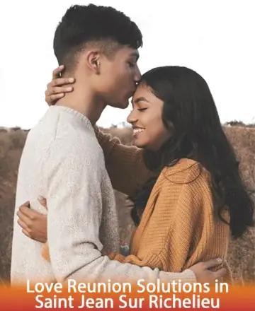 A couple embraces in an autumn field, the man gently kissing the woman's forehead. She smiles, wearing a cozy orange sweater. The warm hues evoke a romantic atmosphere.